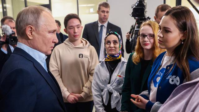 Russian President Vladimir Putin meets with students of Lomonosov Moscow State University in Moscow