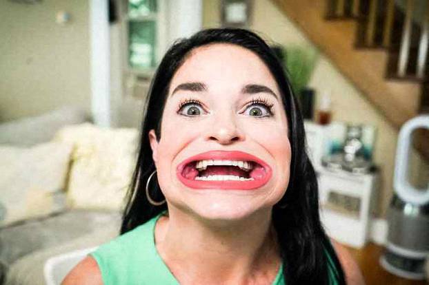 EXCLUSIVE: Woman with BIGGEST MOUTH bags second world record – hitting back at trolls calling her smile ‘scary’