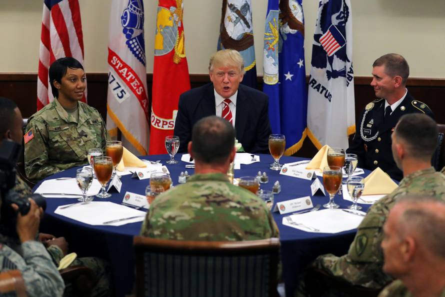 U.S. President Donald Trump attends a lunch with members of the U.S. military during a visit at the U.S. Central Command (CENTCOM) and Special Operations Command (SOCOM) headquarters in Tampa