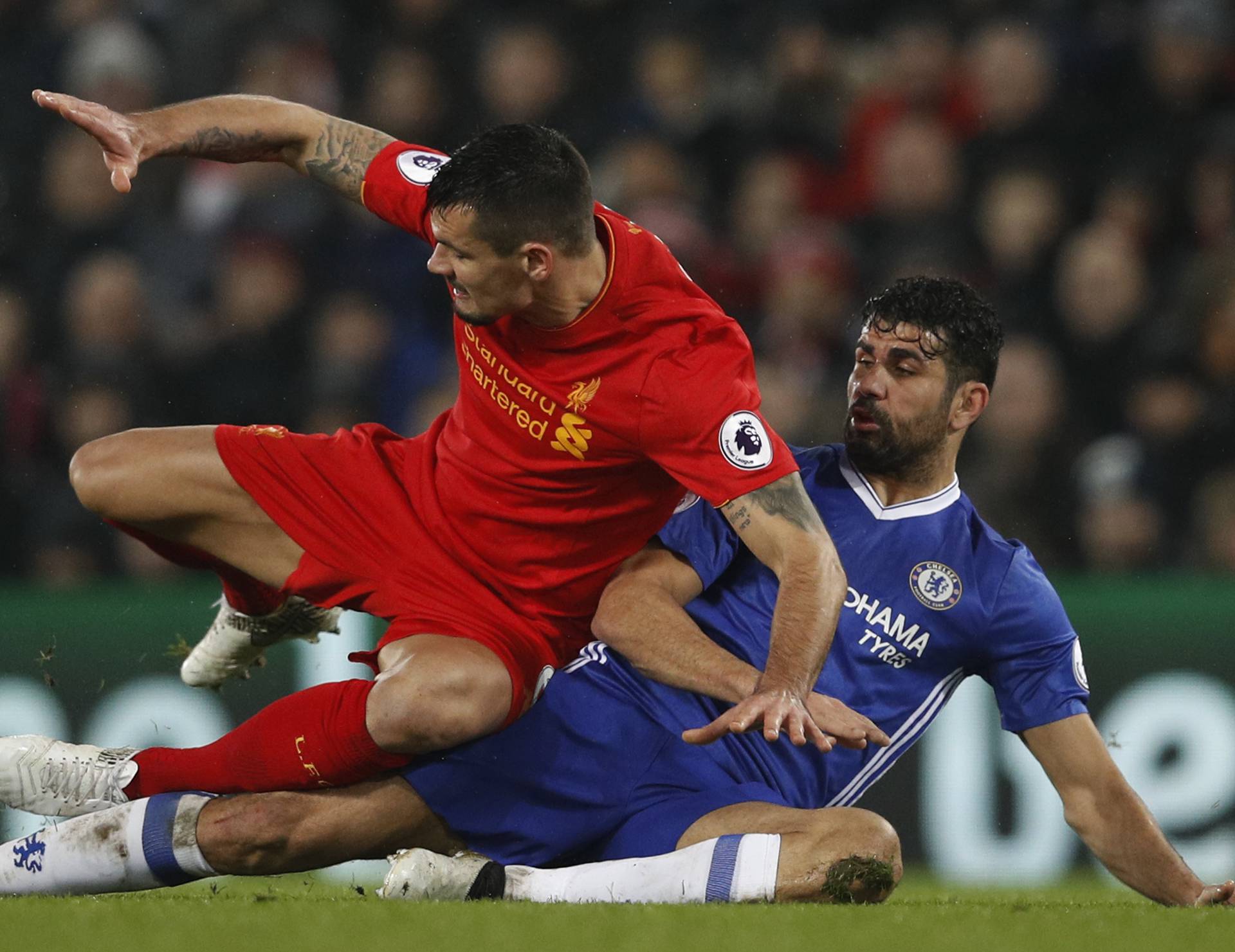Liverpool's Dejan Lovren in action with Chelsea's Diego Costa