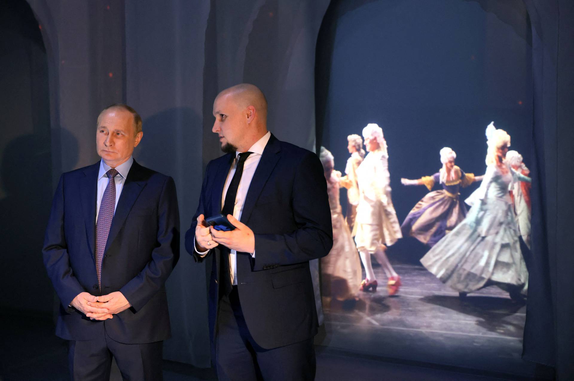 Russian President Vladimir Putin visits an exhibition in Moscow