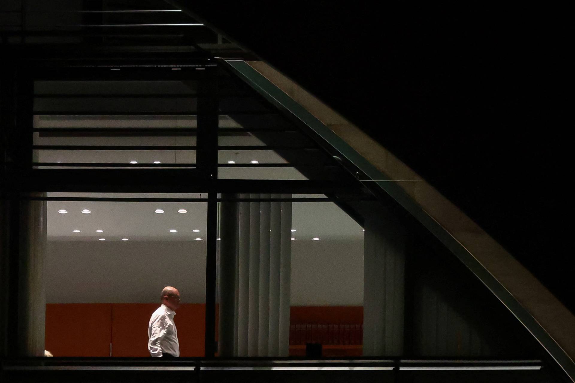 German Chancellor Scholz is seen in the Chancellor's office before a coalition meeting, in Berlin