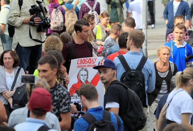 A participant holds a placard during a rally ahead of a local election in Moscow