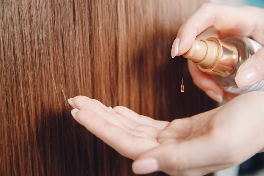 Oil hair treatment for woman. Concept hairdresser spa salon