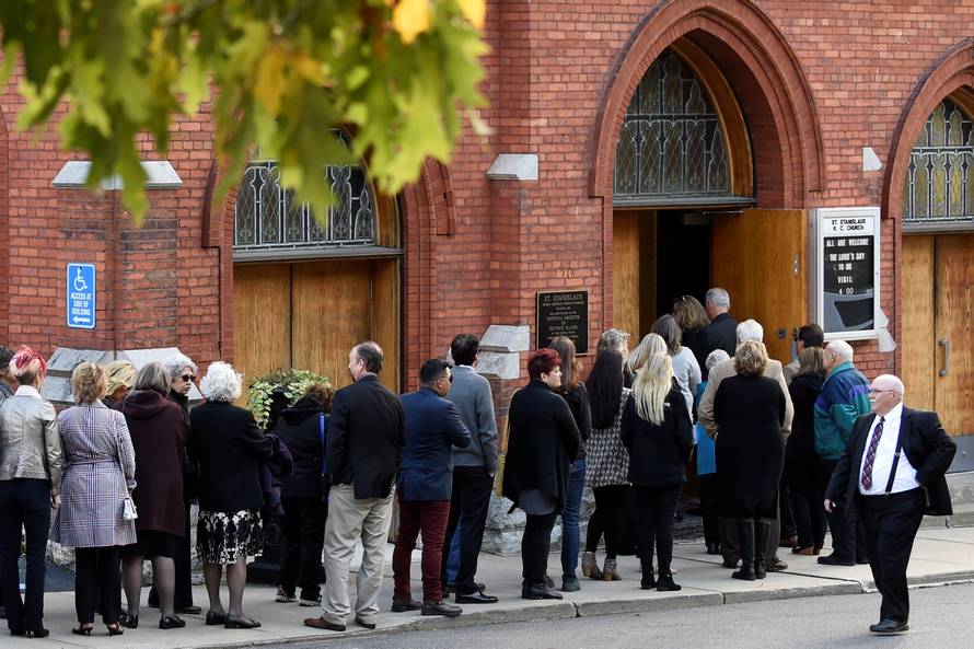 Mourners attend a combined wake for the victims of Saturday's limousine crash in Amsterdam