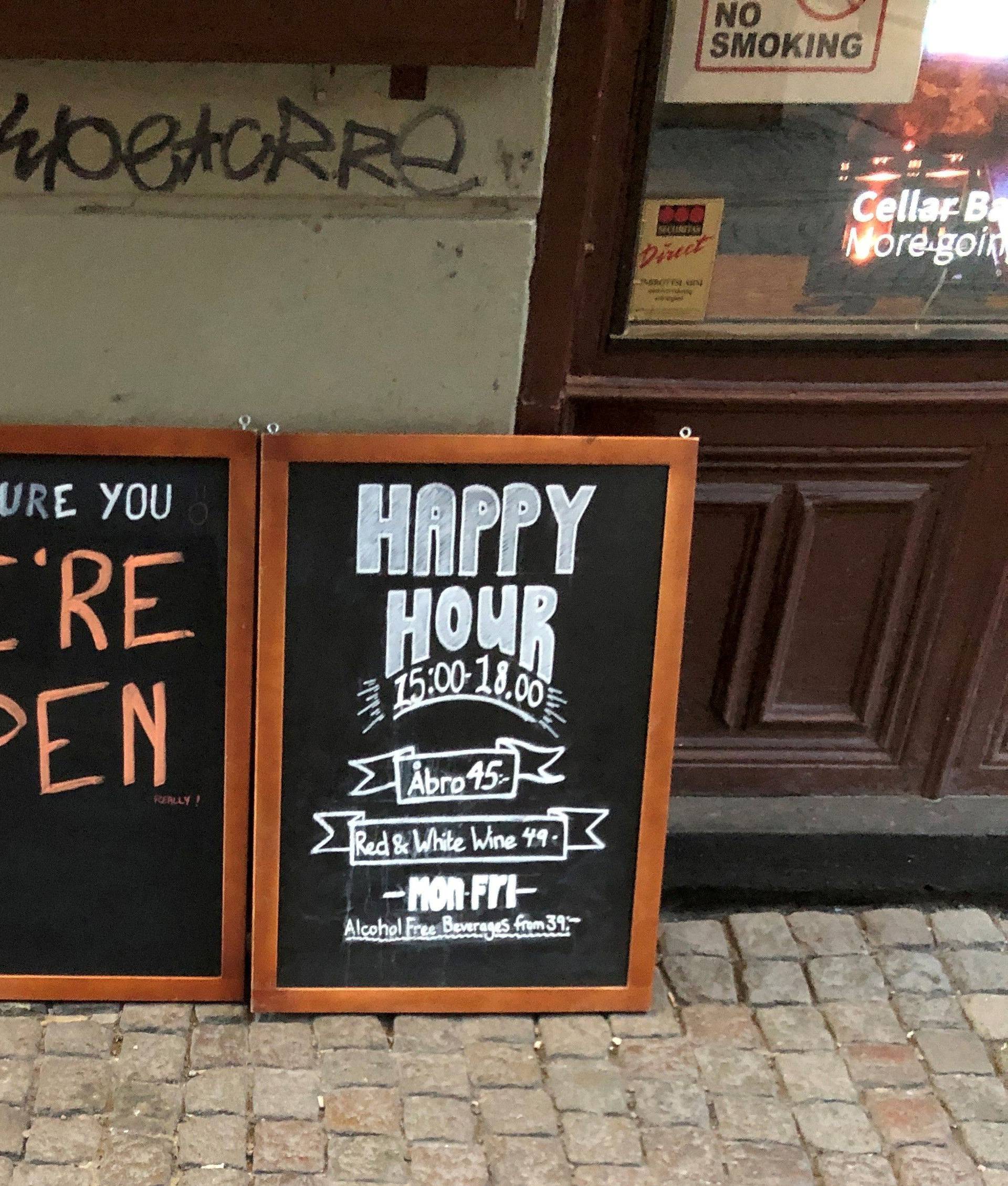 FILE PHOTO: Sign assures people that bar is open during coronavirus outbreak in Stockholm