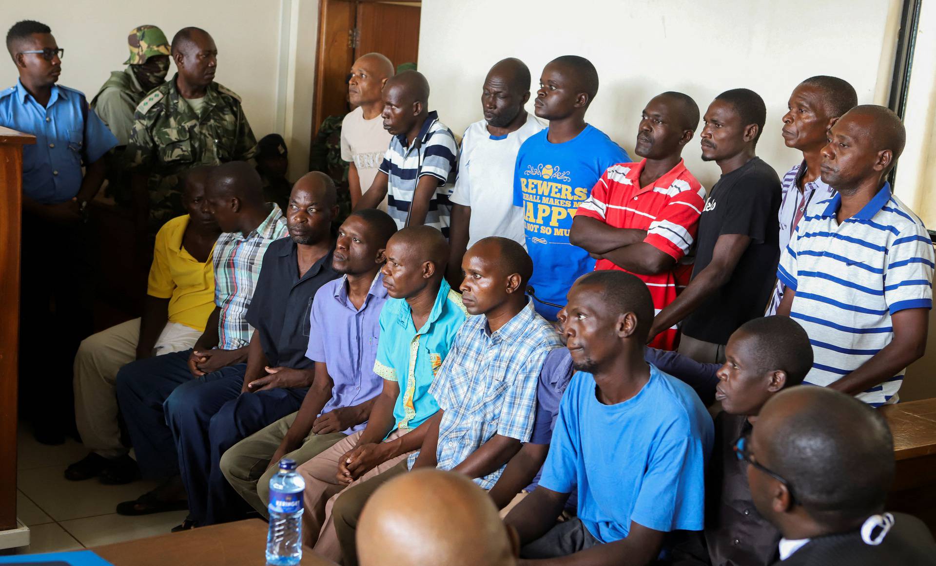 Paul Mackenzie, a Kenyan cult leader accused of ordering his followers, who were members of the Good News International Church, to starve themselves to death in Shakahola forest, stands in the dock at the Malindi Law Courts