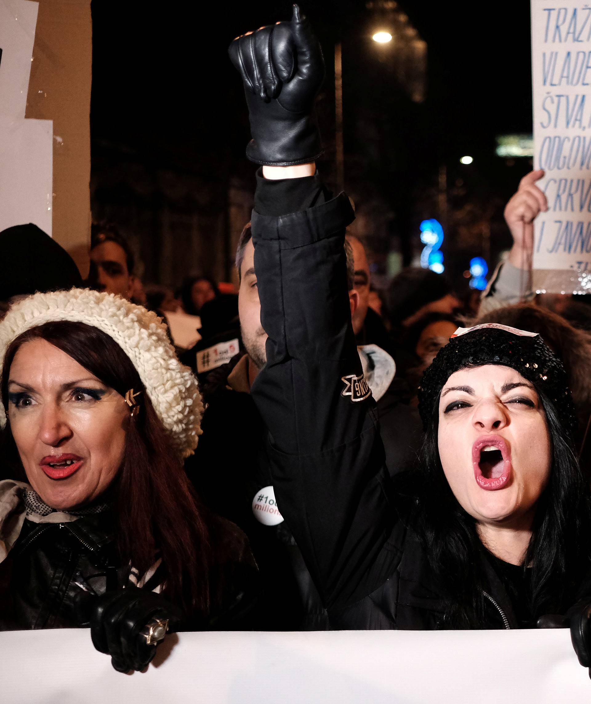  A woman shouts during an anti-government protest in Belgrade