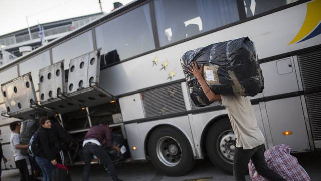 Refugees and migrants arrive in the port of Piraeus