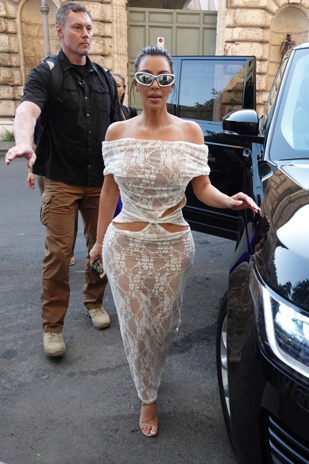 *EXCLUSIVE* Kim Kardashian tours the Vatican wearing a stunning white lace dress