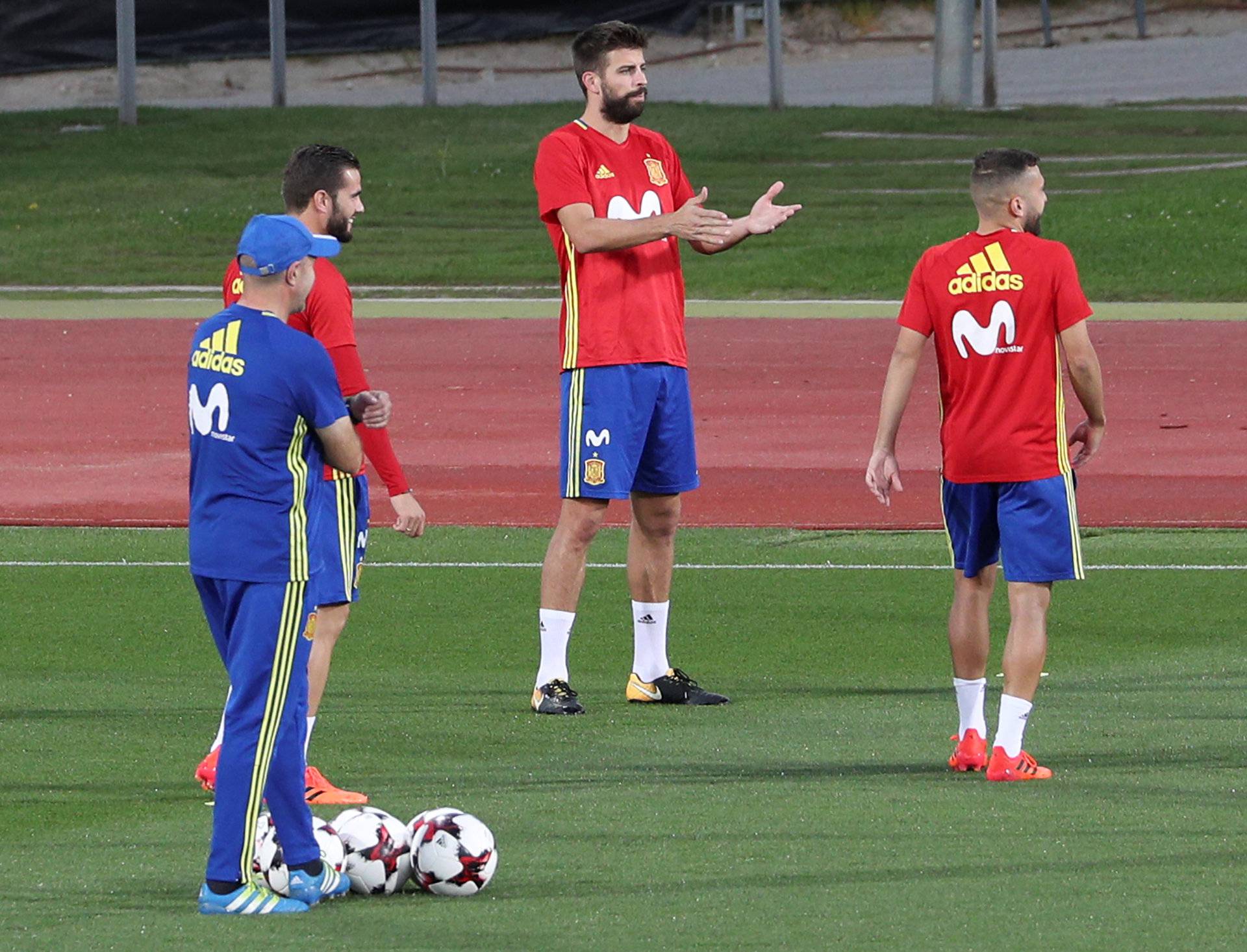 Spain's player Pique gestures during a training session in Las Rozas