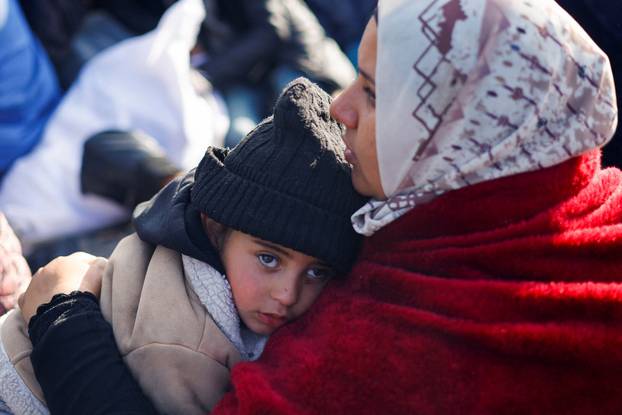 Displaced Palestinians wait to be allowed to return to their homes in northern Gaza, in the central Gaza Strip