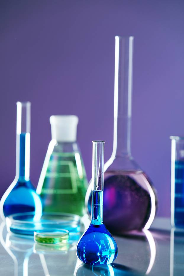 Laboratory Glass With Colorful Liquid.