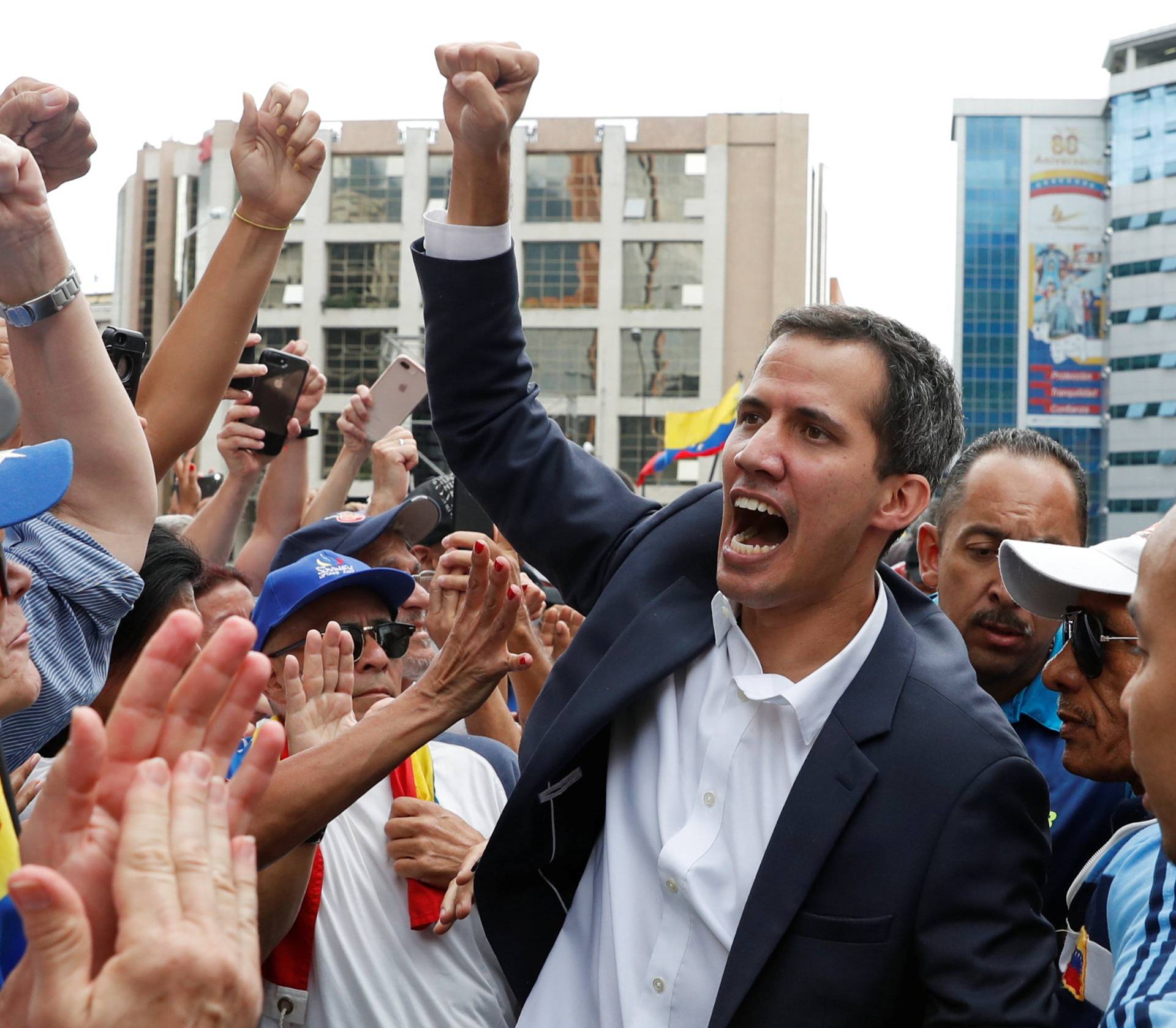 Opposition supporters hold rallies against Venezuelan President Nicolas Maduro's government