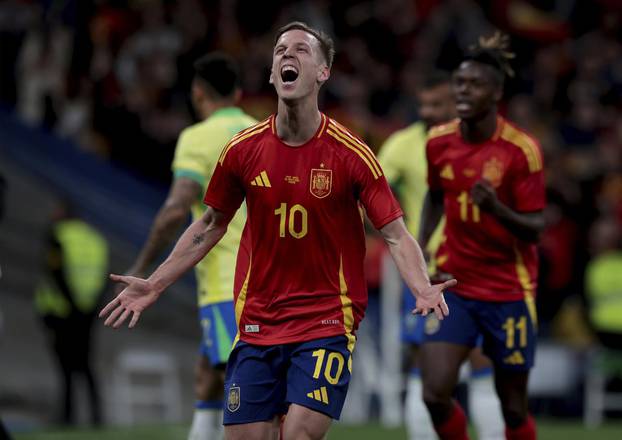 Spain draws Brazil 3-3 in a friendly match