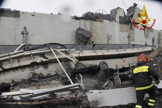 The collapsed Morandi Bridge is seen in the Italian port city of Genoa in this picture released by Italian firefighters