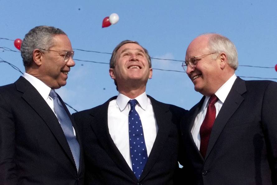 FILE PHOTO: BUSH POWELL AND CHENEY AT END OF RALLY.