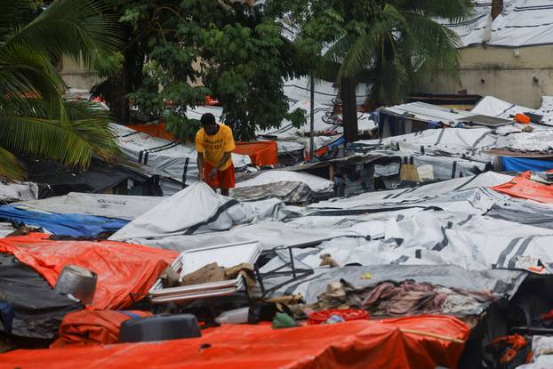 Haitians shelter from Hurricane Melissa's rains at church housing people displaced by gang violence, in Port-au-Prince