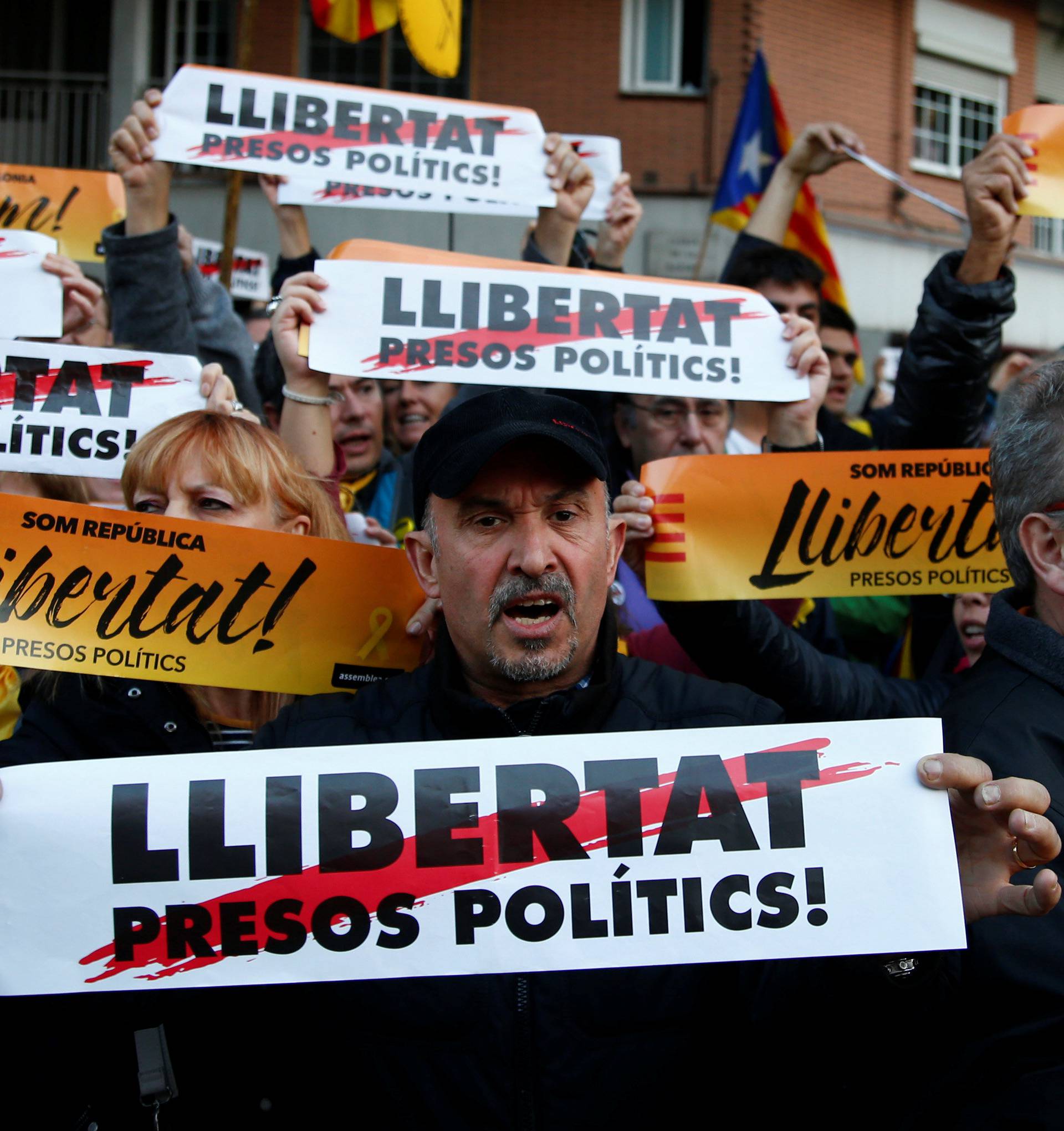 Protesters take part in a demonstration called by pro-independence asociations asking for the release of jailed Catalan activists and leaders, in Barcelona