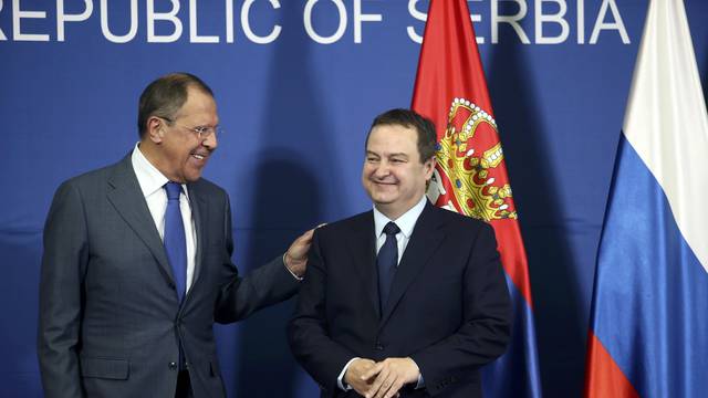 Serbian Foreign Minister Dacic and his Russian counterpart Lavrov arrive for a press conference in Belgrade