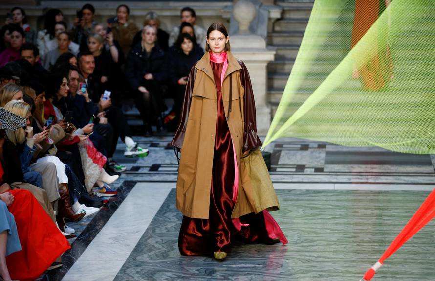 Models present creations during the Roksanda catwalk show at the Foreign & Commonwealth Office during London Fashion Week in London