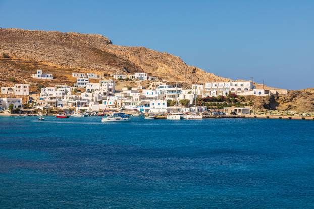 Cutters and boats moored in Karavostasi marina, Folegandros Island, Greece.