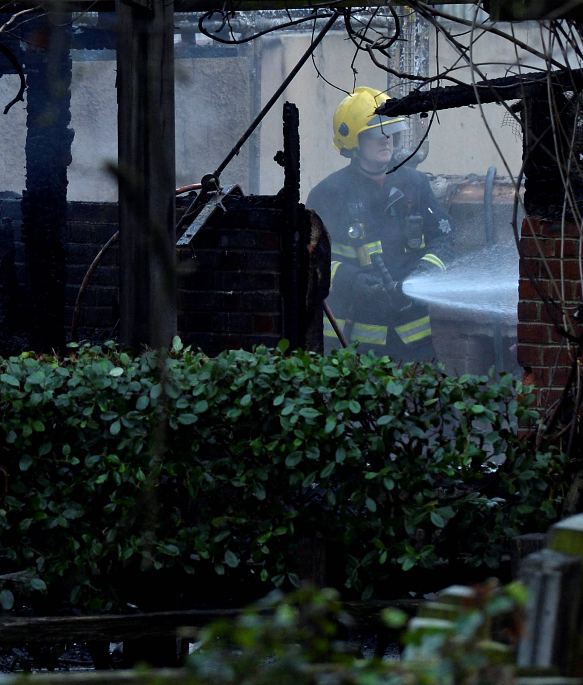 Firefighters attend a blaze at London Zoo following a fire which broke out at a shop and cafe at the attraction, in central London