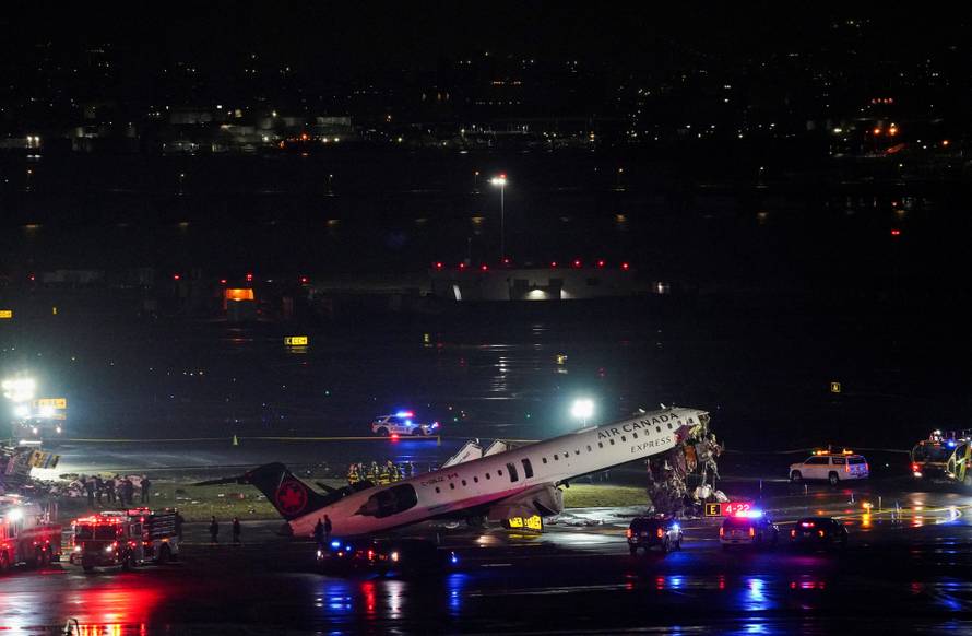 Air Canada Express jet collides with a ground vehicle at LaGuardia airport
