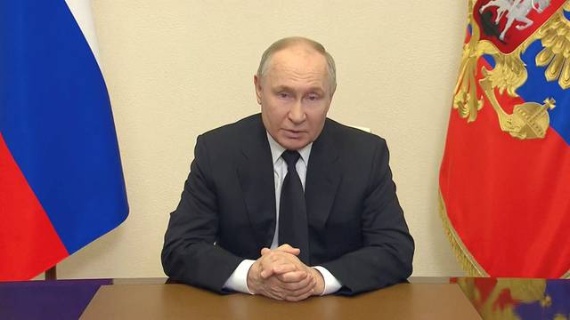 Russian President Vladimir Putin delivers a video address to the nation