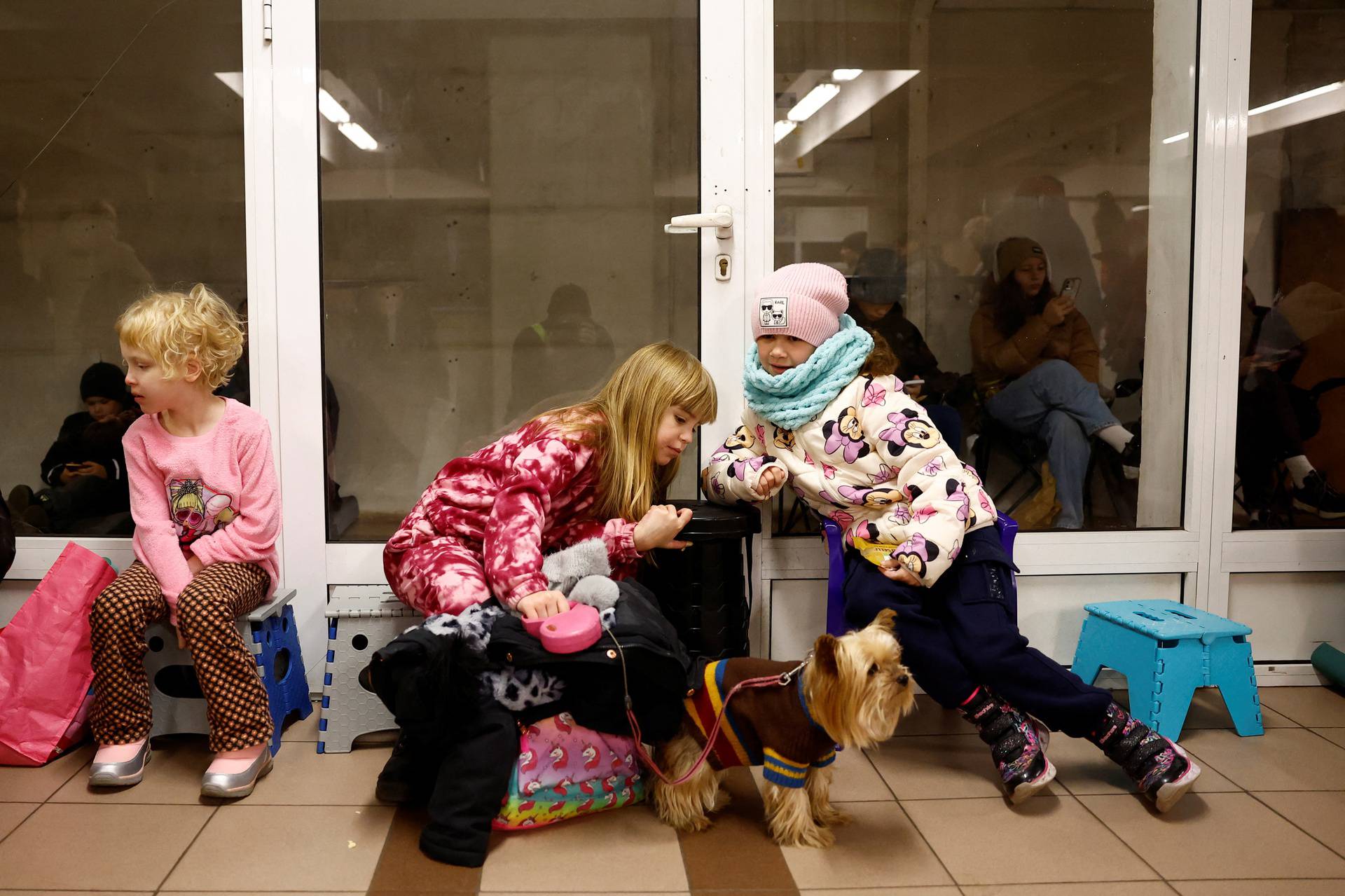 People take shelter during a Russian missile and drone attack, in Kyiv