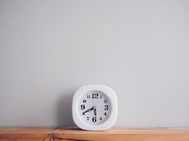 Simple clock show early morning and almost evening time.