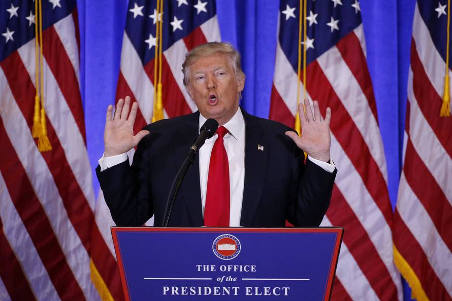 U.S. President-elect Donald Trump speaks during a news conference in the lobby of Trump Tower in Manhattan, New York City
