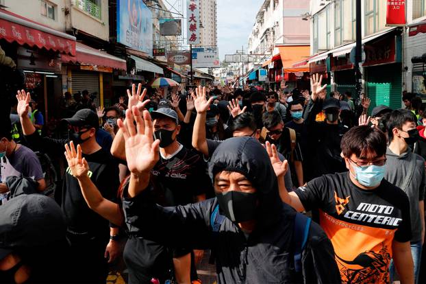 Anti-government protesters march during anti-parallel trading protest at Sheung Shui, a border town in Hong Kong