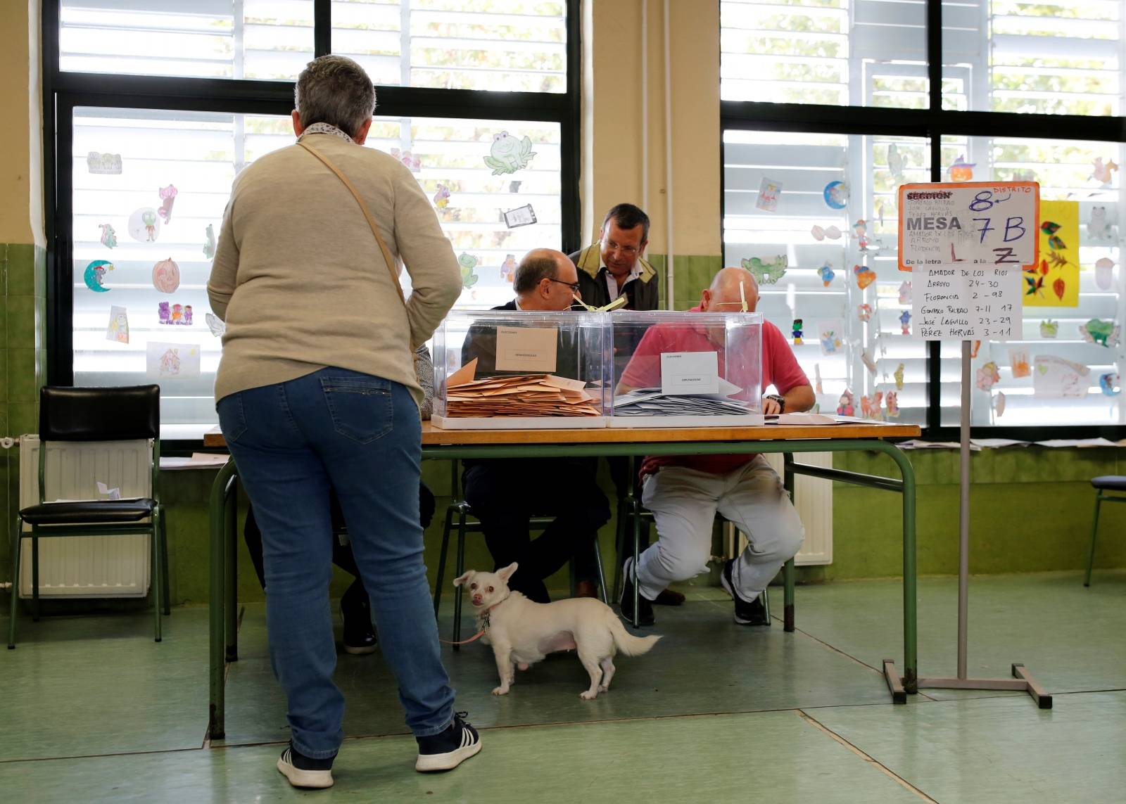 Woman votes during general election in Seville