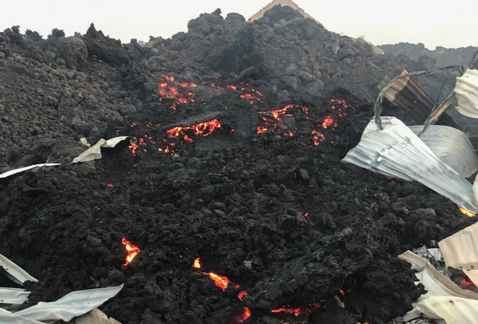 Smouldering lava deposited by the eruption of Mount Nyiragongo volcano is seen near Goma