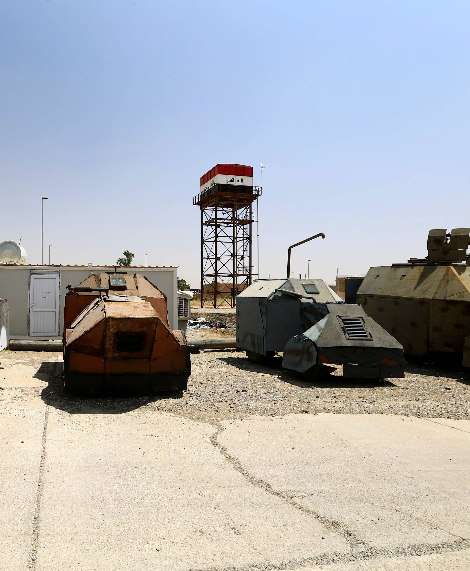 Vehicles used for suicide car bombings, made by Islamic State militants, are seen at Federal Police Headquarters after being confiscated in Mosul