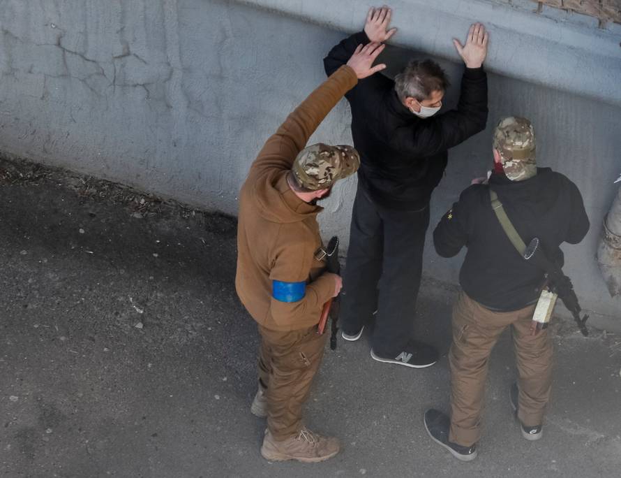 Members of the Ukrainian Territorial Defense Forces patrol Kyiv
