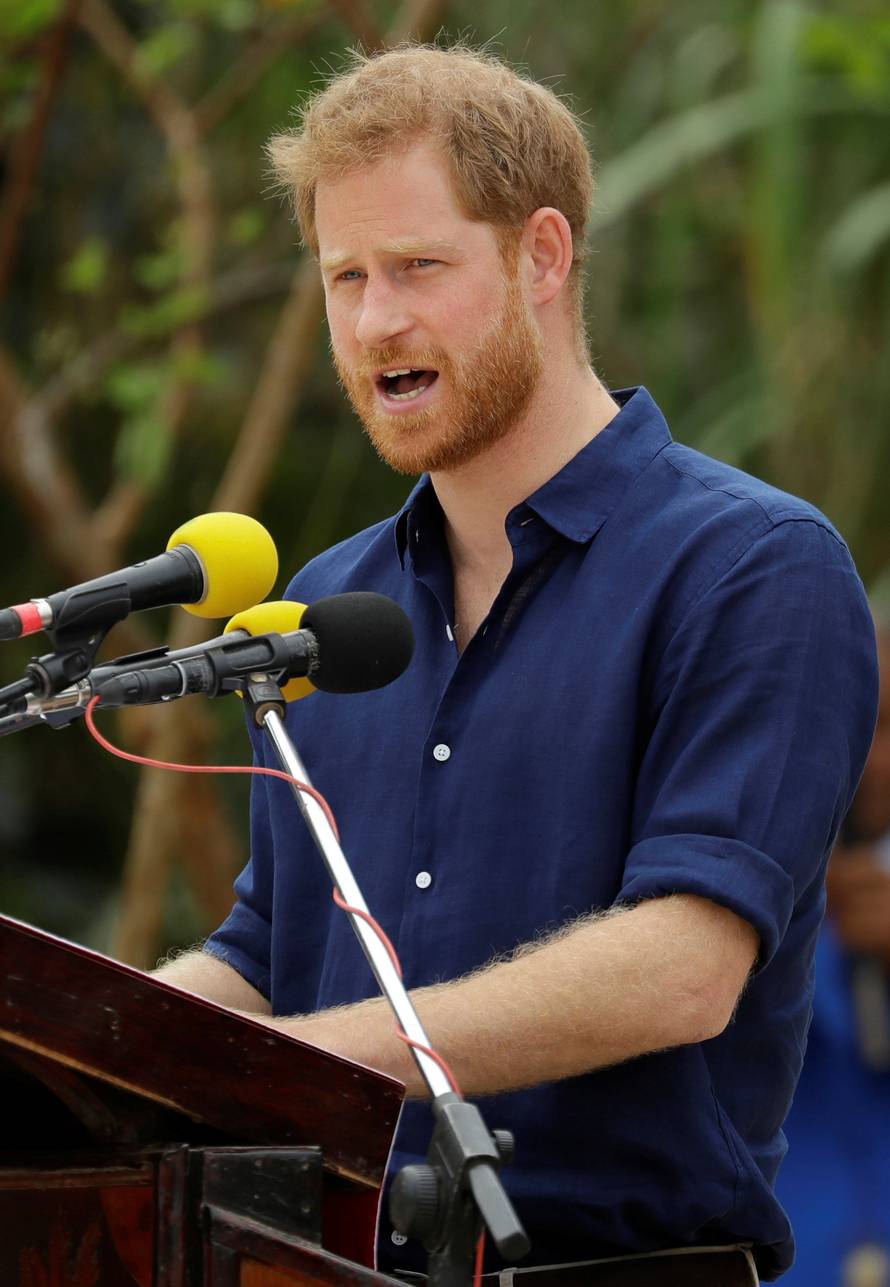 Britain's Prince Harry gives a speech during a visit to Tupou College in Tonga, Friday,