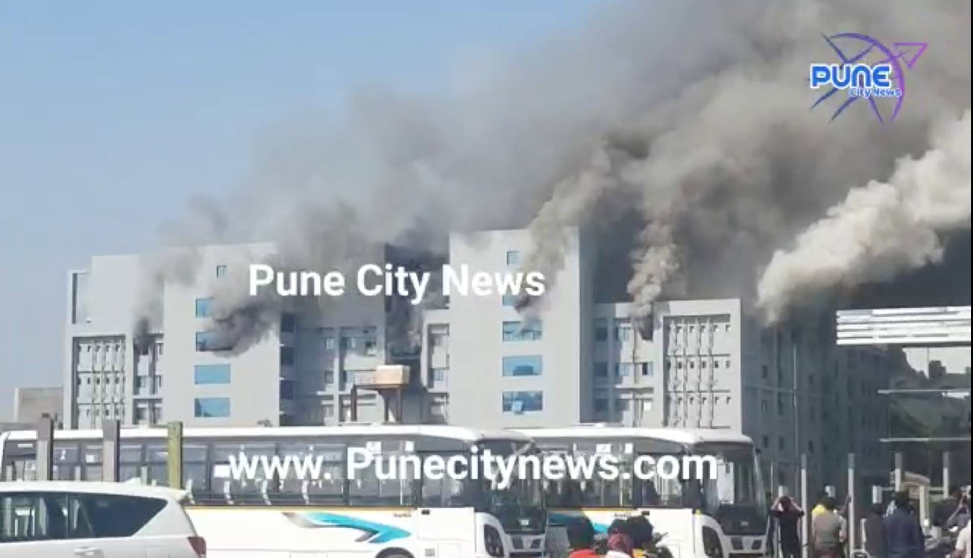 Smoke rises from fire at a site of Serum Institute of India in Pune