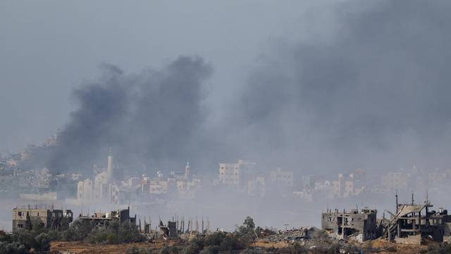 Smoke rises in Gaza, as seen from southern Israel