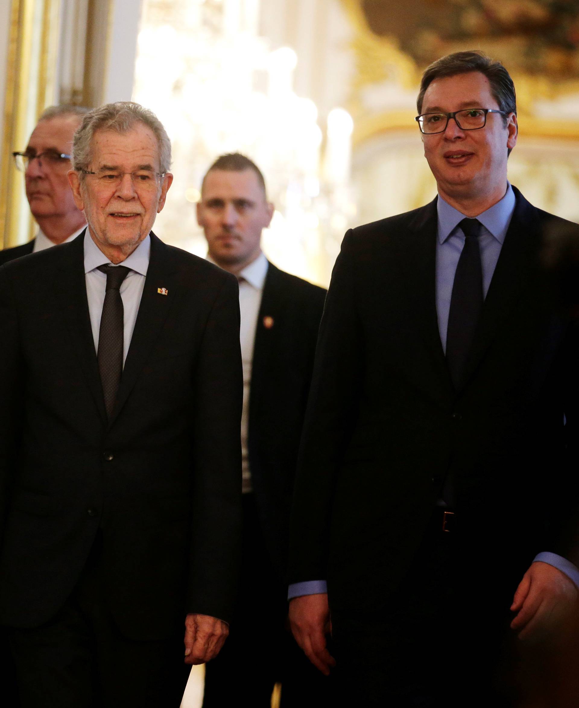 Austria's President Van der Bellen and Serbia's President Vucic arrive at the presidential office in Vienna