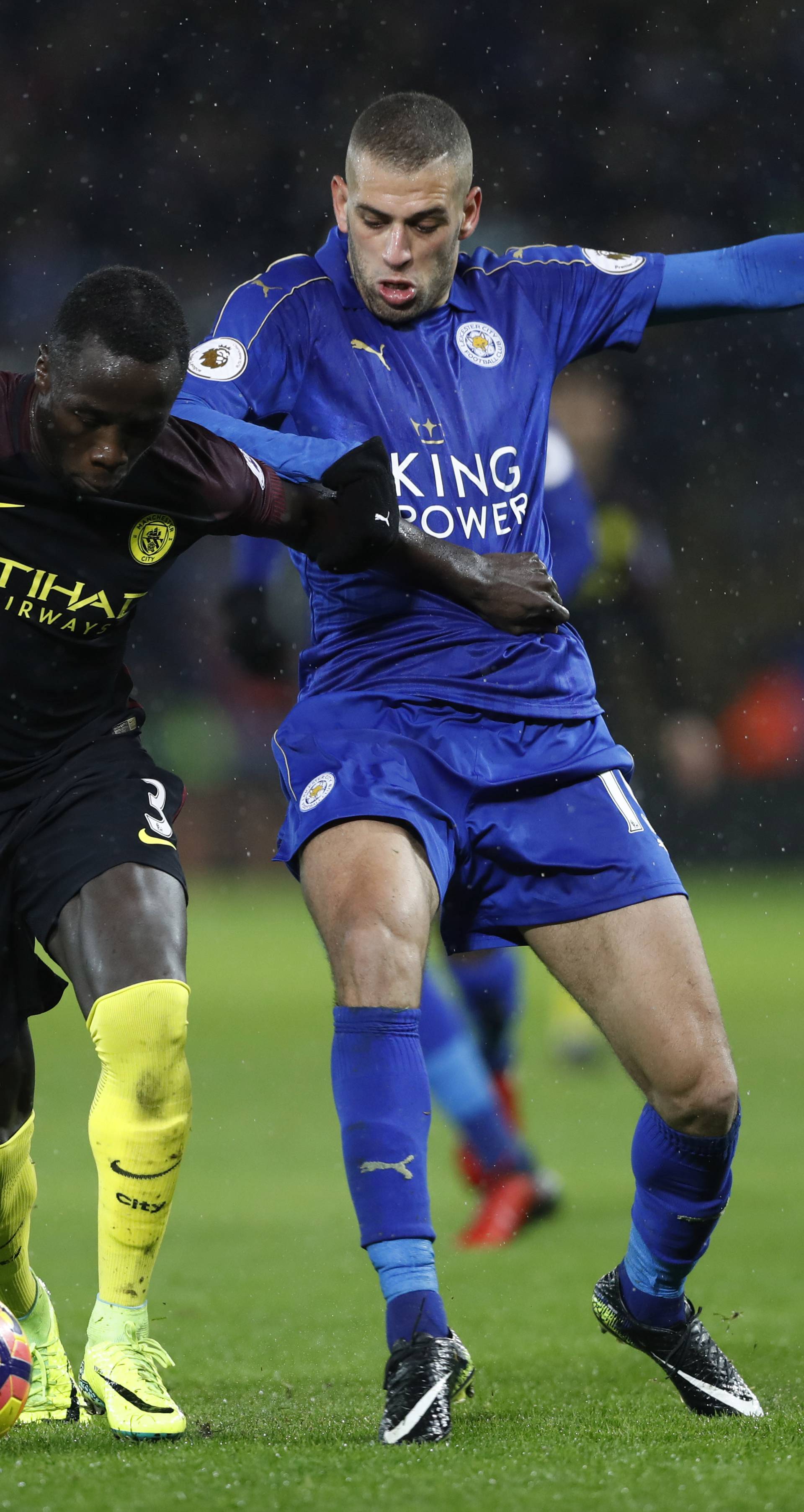 Manchester City's Bacary Sagna in action with Leicester City's Islam Slimani