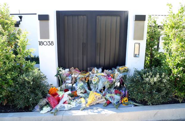 Flowers are pictured outside the home of late actor Matthew Perry in Pacific Palisades