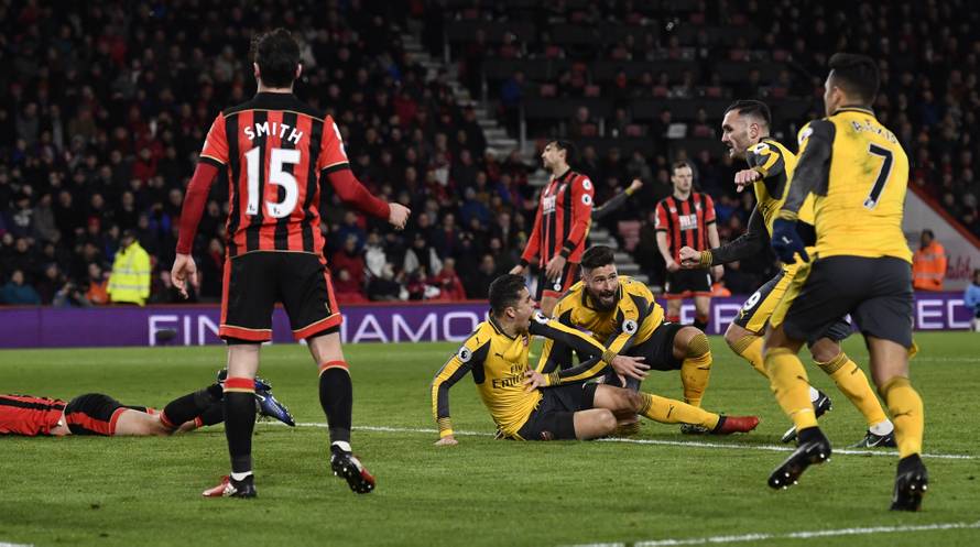 Arsenal's Olivier Giroud celebrates scoring their third goal