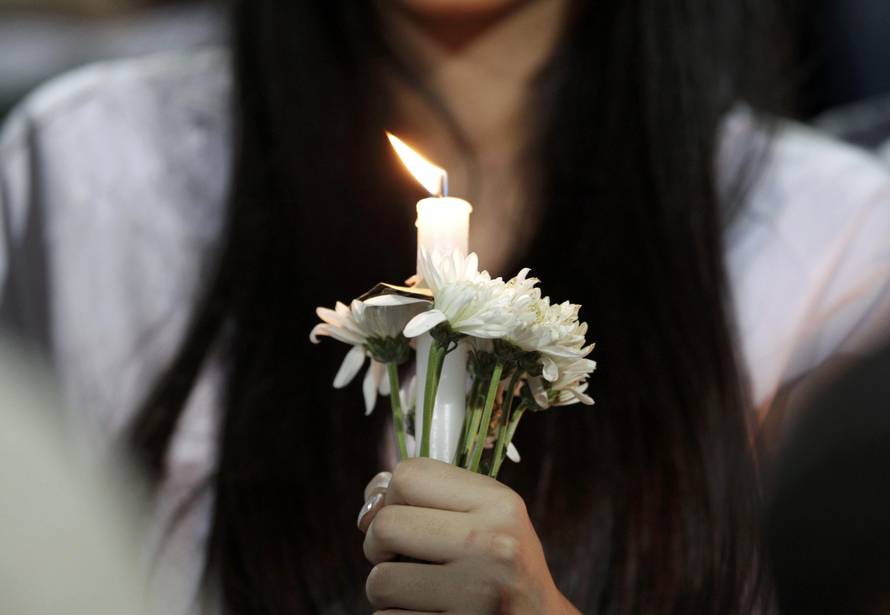 Fans of Atletico Nacional soccer club pay tribute to the players of Brazilian club Chapecoense killed in the recent airplane crash in Medellin