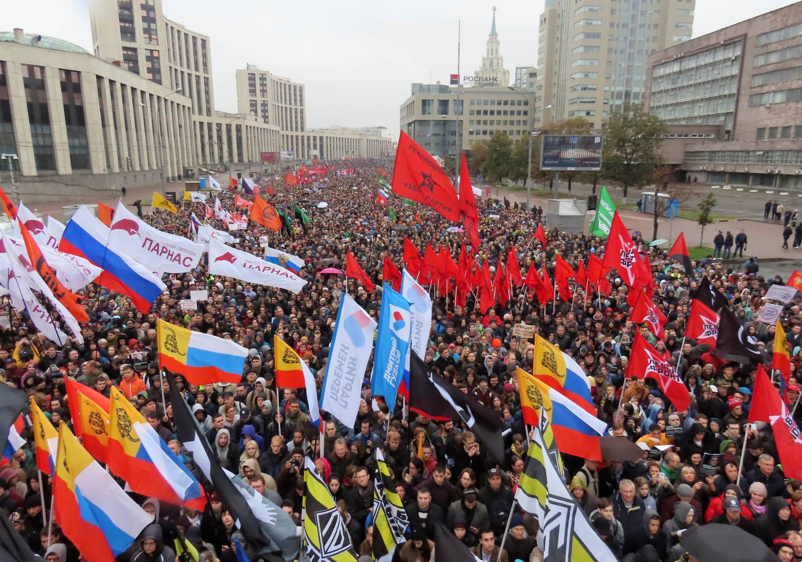 People attend a rally to demand the release of jailed protesters in Moscow