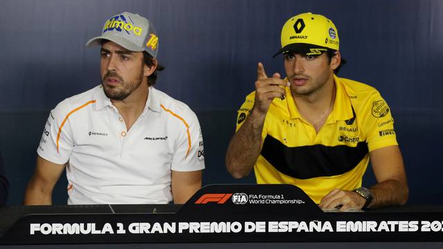 FILE PHOTO: McLaren's Fernando Alonso and Renault's Carlos Sainz at Circuit de Barcelona-Catalunya, Barcelona, Spain - May 10, 2018