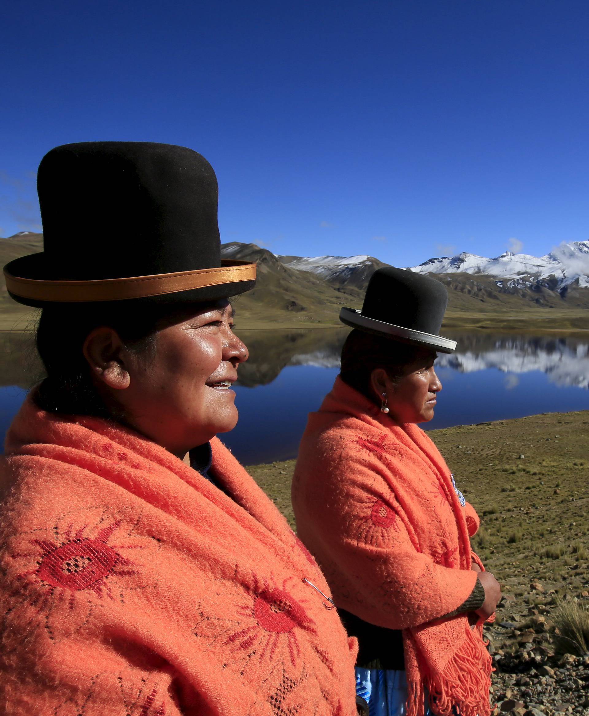 The Wider Image: Bolivia's cholita climbers