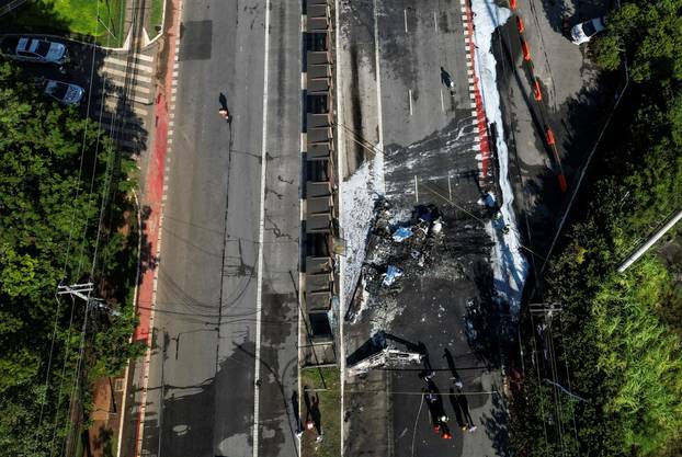 Small plane crashes into vehicles on busy Sao Paulo avenue