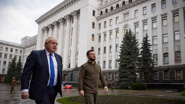 Ukraine's President Zelenskiy welcomes British PM Johnson walk in central Kyiv